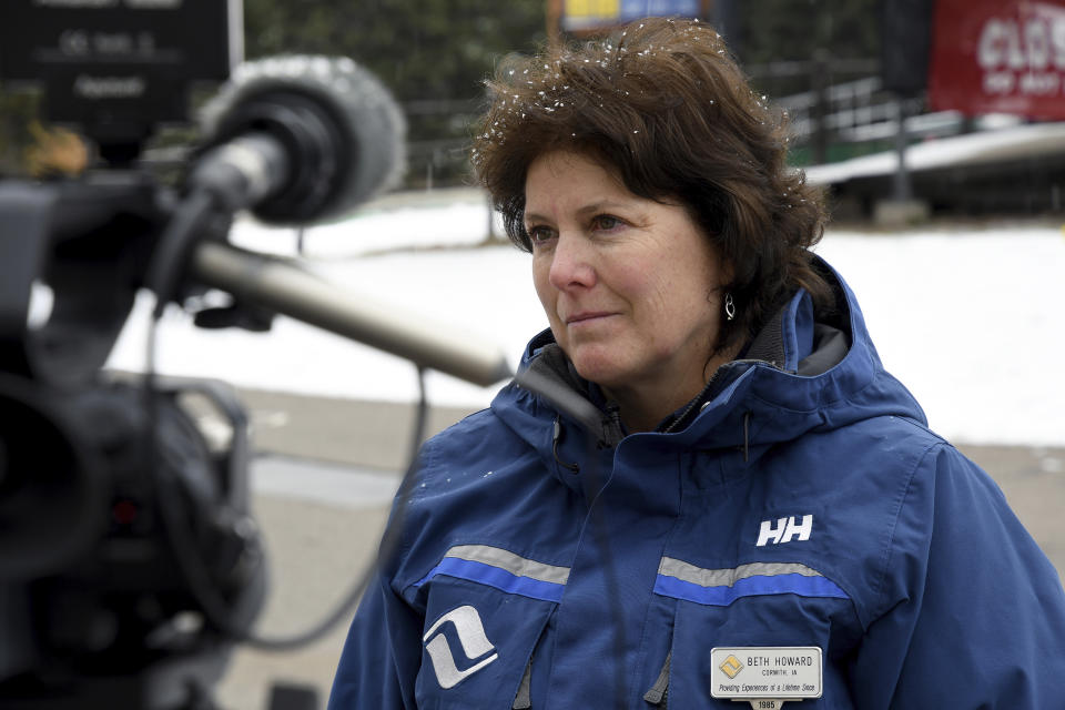 Vail Mountain COO Beth Howard is interviewed in Vail, Colo., on Oct. 25, 2022. For more than six years, Vail Resorts has been trying to build apartments for about 160 of its workers on a property called Booth Heights. Opponents say the project would encroach on the bighorn sheep herd that frequents the area. (AP Photo/Thomas Peipert)
