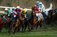 Horse Racing - Grand National Festival - Aintree Racecourse, Liverpool, Britain - April 14, 2018 Tiger Roll ridden by Davy Russell (R) in action at Canal Turn before winning the 17:15 Randox Health Grand National Handicap Chase Action Images via Reuters/Jason Cairnduff