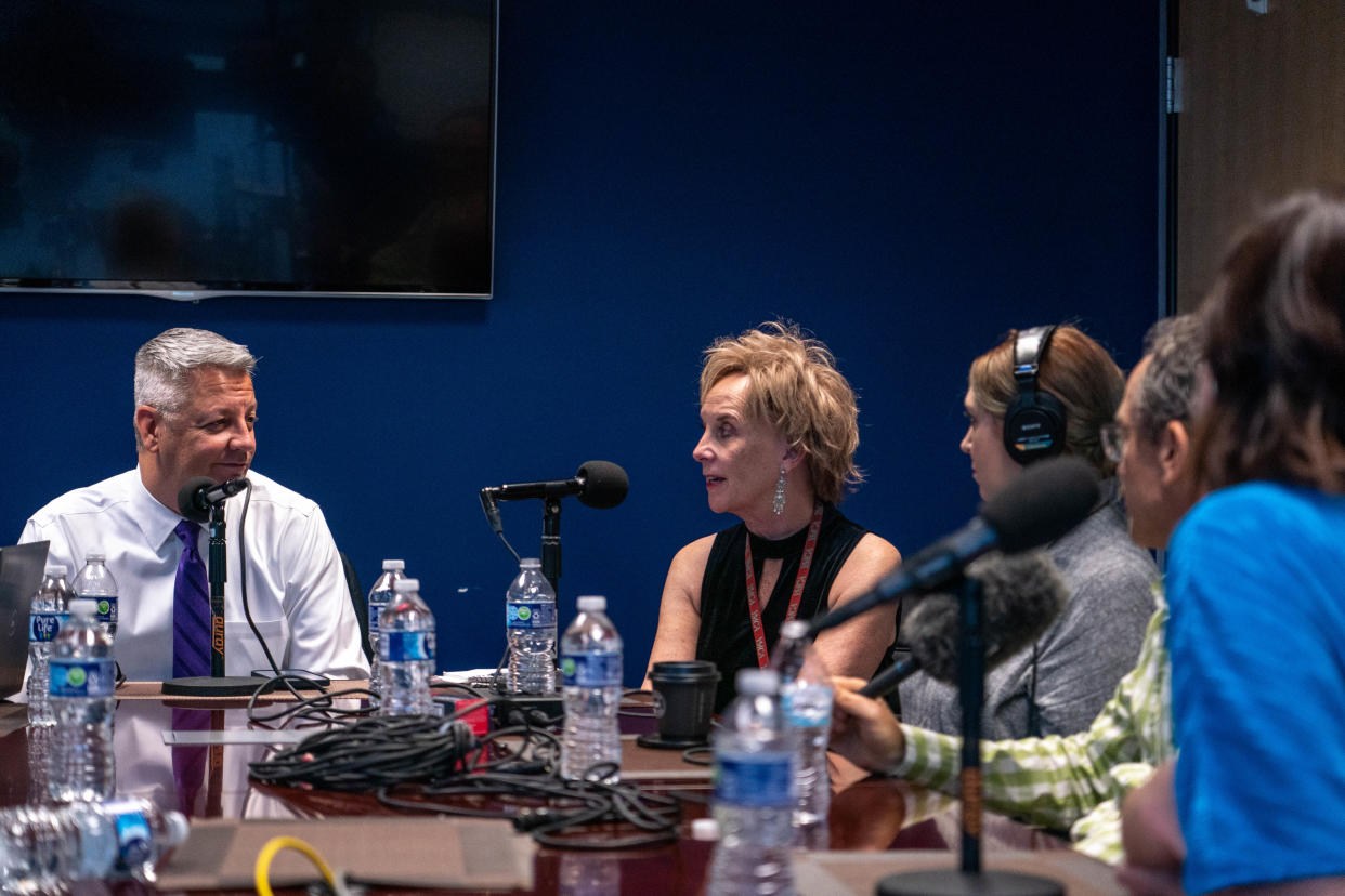 The Arizona Republic's Ronald J. Hansen, left, host of The Gaggle podcast, records an episode of The Gaggle with Republic reporters at the newsroom in Phoenix on Dec. 15, 2022.