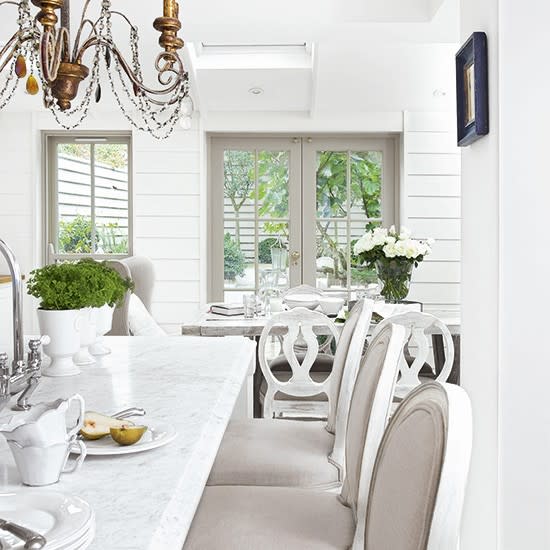 Blend French country with chateau chic kitchen style