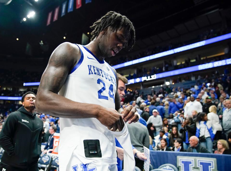 Kentucky forward Chris Livingston (24) walks off the court after a loss to Vanderbilt in a quarterfinal SEC Men's Basketball Tournament game at Bridgestone Arena on March 10, 2023, in Nashville, Tenn.