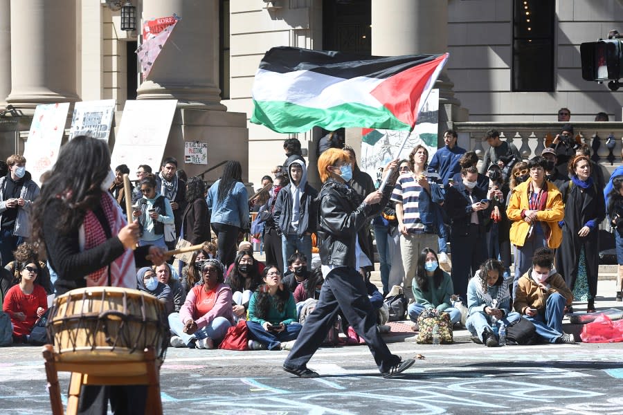 Several hundred students and pro-Palestinian supporters rally at the intersection of Grove and College Streets, in front of Woolsey Hall on the campus of Yale University in New Haven, Conn. April 22, 2024. (Ned Gerard/Hearst Connecticut Media via AP)