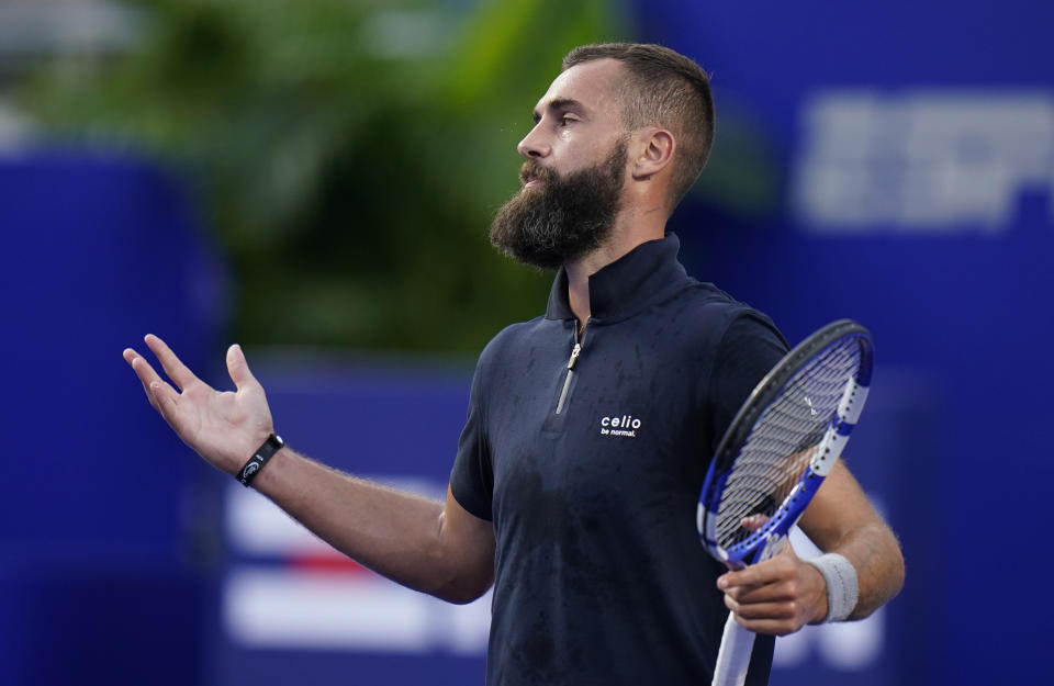 Benoit Paire of France gesture during a match against to Daniil Medvedev of Russia at the Mexican Open tennis tournament in Acapulco, Mexico, Tuesday, Feb. 22, 2022. (AP Photo/Eduardo Verdugo)