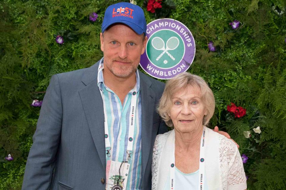 <p>John Phillips/Getty</p> Woody Harrelson and mother Diane Harrelson during Wimbledon on July 15, 2017 in London, England.  