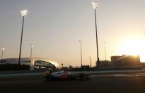 McLaren Formula One driver Sergio Perez of Mexico drives during the qualifying session of the Abu Dhabi F1 Grand Prix at the Yas Marina circuit on Yas Island, November 2, 2013. REUTERS/Ahmed Jadallah (UNITED ARAB EMIRATES - Tags: SPORT MOTORSPORT F1)