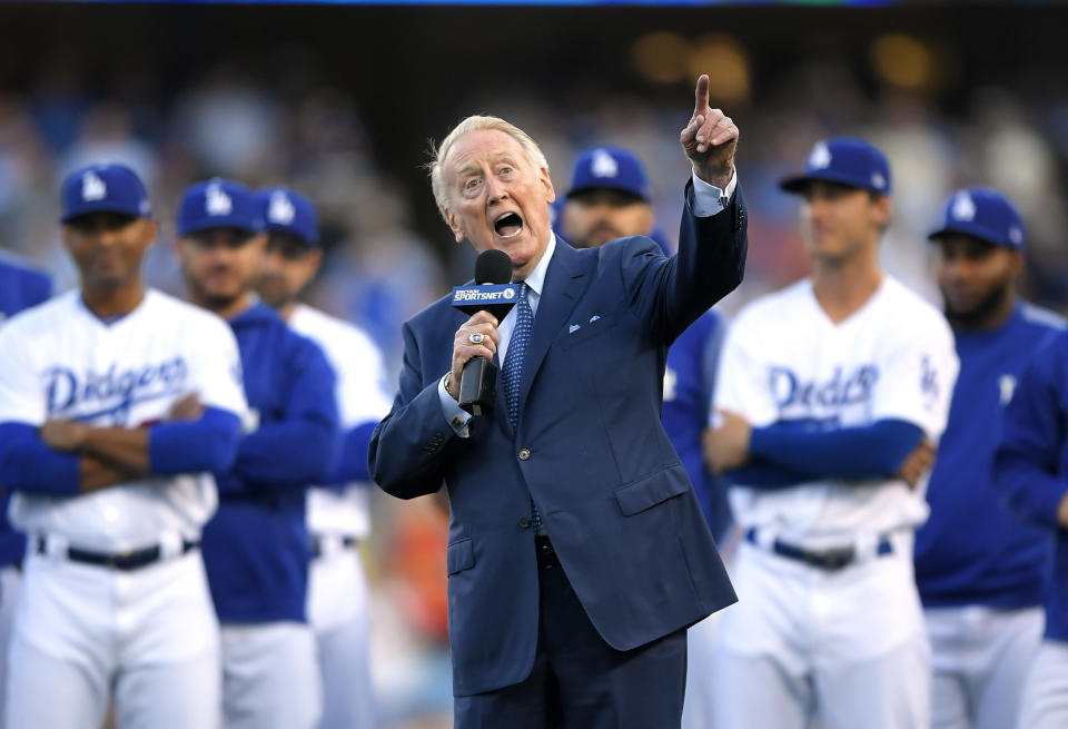 Vin Scully, seen here in May, says he'll only return to Dodger Stadium as a fan for the World Series. (AP)