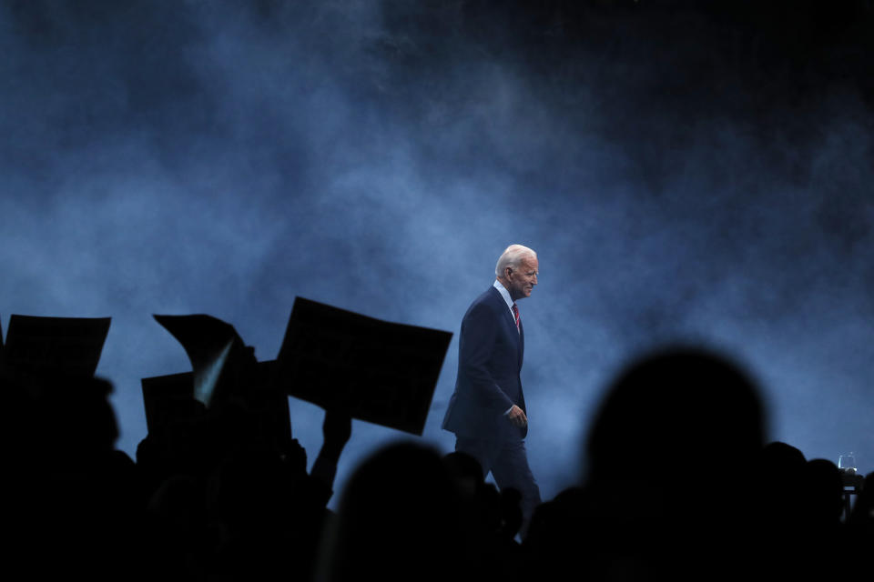 FILE - In this Nov. 1, 2019, file photo Democratic presidential candidate former Vice President Joe Biden walks on stage to speak at the Iowa Democratic Party's Liberty and Justice Celebration in Des Moines, Iowa. Early polling in the general election face-off between President Donald Trump and Biden bears out a gap between the two contenders when it comes to who Americans see as more compassionate to their concerns. (AP Photo/Charlie Neibergall, File)