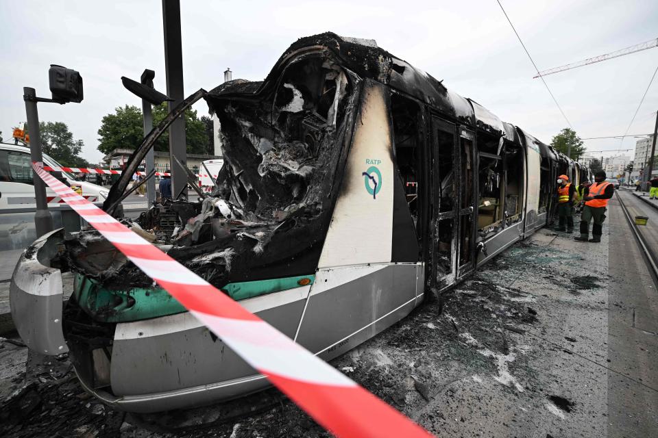 A burnt tram following violence and protests in a Paris suburb in reaction to the shooting of a 17-year-old boy by police at point-blank range in Nanterre, Paris.