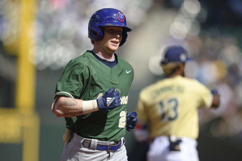 Chicago Cubs' Pete Crow-Armstrong jogs back to the dugout during the first inning of the All-Star Futures baseball game.