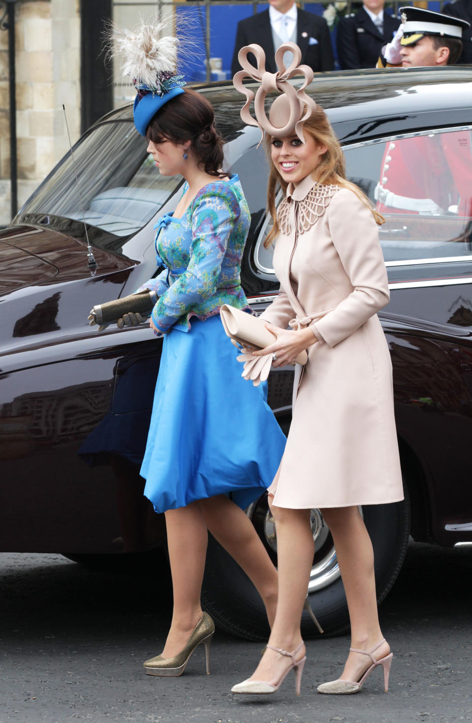 Princess Beatrice and Princess Eugenie attend Wills and Kate's royal wedding in famously bad fascinators and dresses