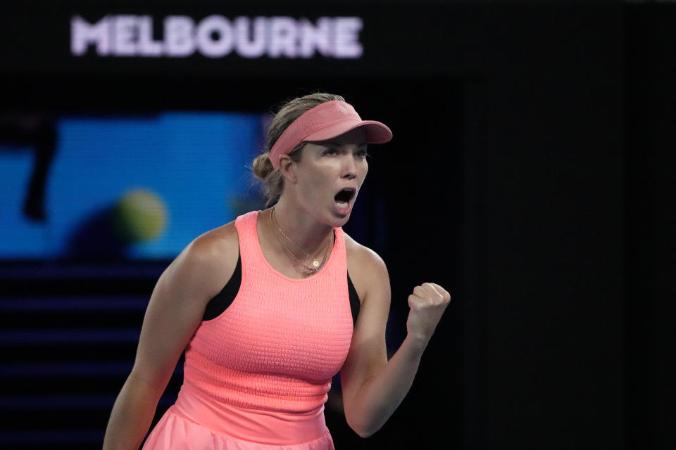 Danielle Collins of the U.S. reacts after winning a point against Iga Swiatek of Poland during their second round match at the Australian Open tennis championships at Melbourne Park, Melbourne, Australia, Thursday, Jan. 18, 2024. (AP Photo/Andy Wong)