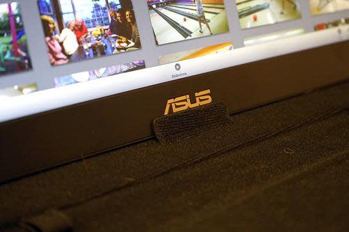 ASUS MB168B+ monitor propped up on its carrying case