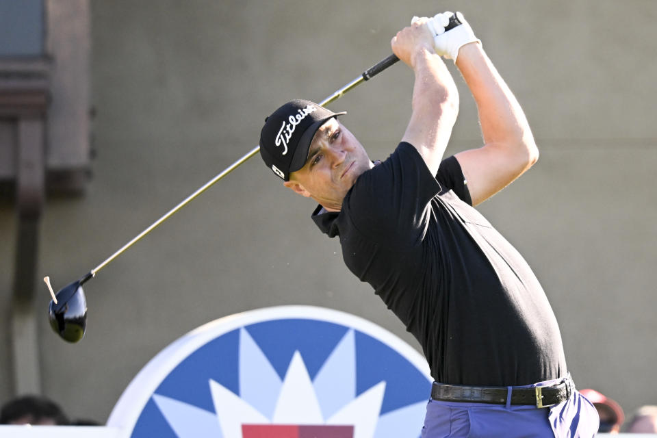 Justin Thomas hits his tee shot on the first hole on the North Course during the second round of the Farmers Insurance Open golf tournament, Thursday Jan. 27, 2022, in San Diego. (AP Photo/Denis Poroy)