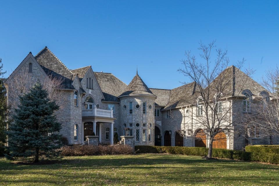 The estate features a turret and several garages. (Effler/Schmitt Co)