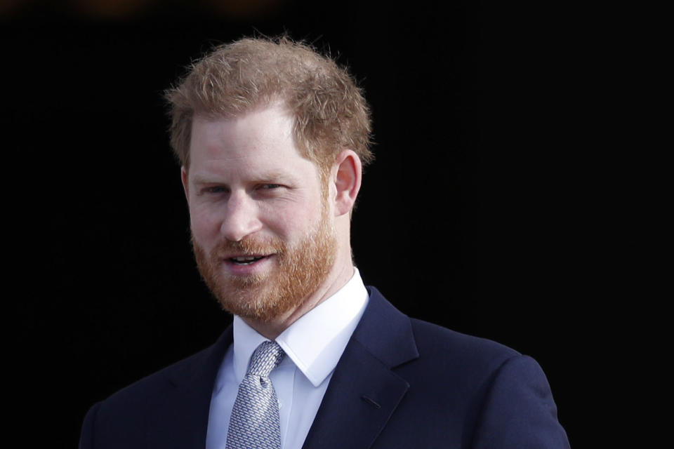 Britain's Prince Harry, Duke of Sussex watches children play rugby league prior to the draw for the Rugby League World Cup 2021 at Buckingham Palace in London on January 16, 2020. (Photo by Adrian DENNIS / AFP) (Photo by ADRIAN DENNIS/AFP via Getty Images)