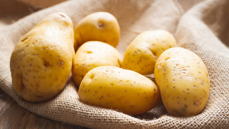 Yukon gold potatoes on table