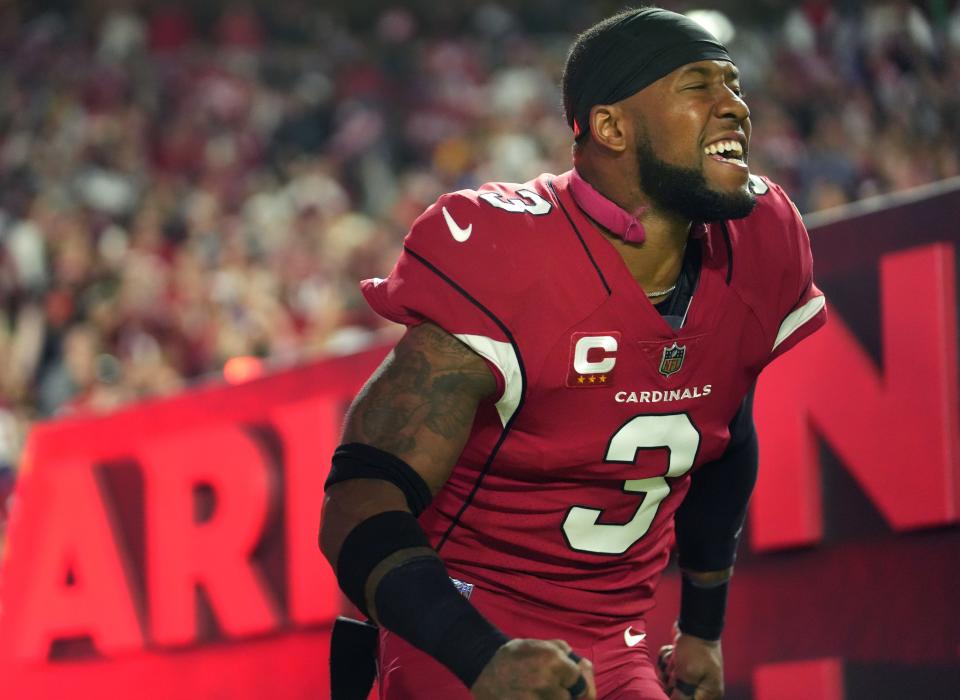 Arizona Cardinals safety Budda Baker (3) runs out on to the field to take on the Tampa Bay Buccaneers at State Farm Stadium in Glendale on Dec. 25, 2022.