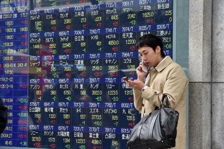 Tokyo's benchmark Nikkei index ended 0.99 percent higher, adding 194.14 points, to 19,754.36