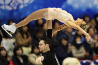 Kirsten Moore-Towers and Michael Marinaro of Canada perform in the pairs free skating program during the ISU Grand Prix of Figure Skating in Sapporo, northern Japan, Saturday, Nov. 23, 2019. (AP Photo/Toru Hanai)