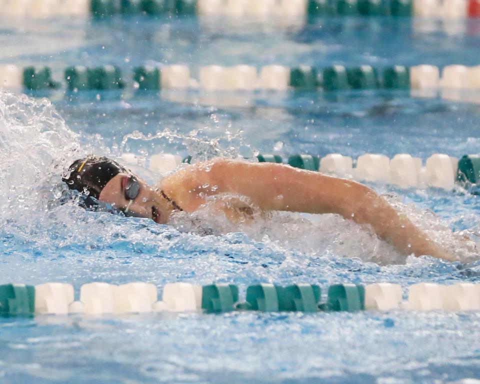 Penn senior Lily Christianson competes in the 100-yard freestyle race during a swimming meet against Concord and New Prairie Thursday, Dec. 14, 2023, at Concord High School in Dunlap.