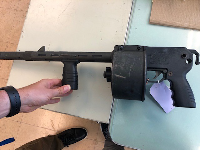 A 12-gauge shotgun seized by law enforcement in Wisconsin. The gun, also known as a Street Sweeper, is a South African-made gun with a revolving magazine that the U.S. federal government classifies as an illegal “destructive device.”