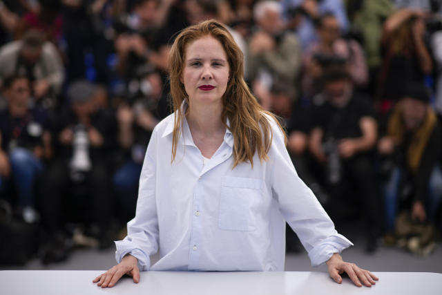 Director Justine Triet poses for photographers at the photo call for the film 'Anatomy of a Fall' at the 76th international film festival, Cannes, southern France, Monday, May 22, 2023. (AP Photo/Daniel Cole)