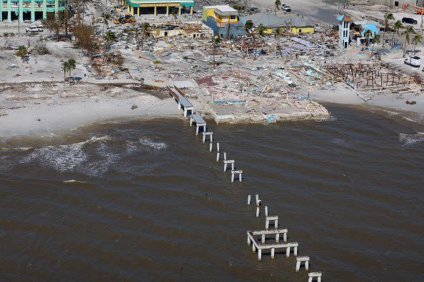 FORT MYERS BEACH,FLORIDA - SEPTEMBER 29: The pilings from Fort Myers Beach pier are all that are left after Hurricane Ian passed through the area on September 29, 2022 in Fort Myers Beach, Florida. The hurricane brought high winds, storm surge and rain to the area causing severe damage. (Photo by Joe Raedle/Getty Images)