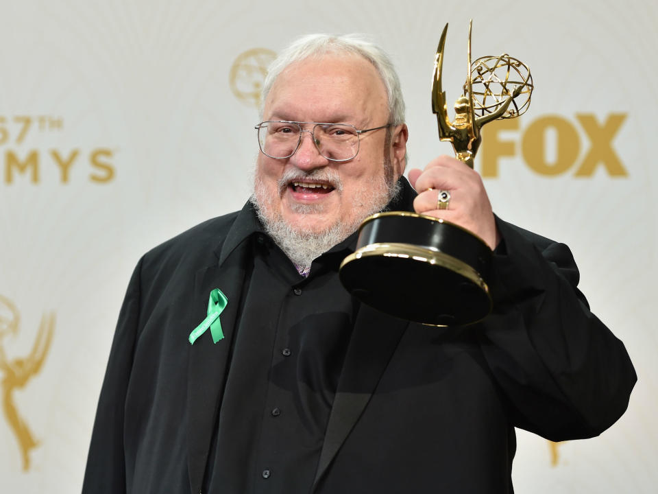 George RR Martin holds up his 2015 Emmy for Outstanding Drama Series for Game of Thrones: Alberto E. Rodriguez/Getty Images