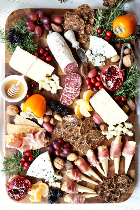 <p>The Baking Fairy</p><p>Impress all your guests this winter season with this simple, gorgeous winter harvest cheese board! It combines cheeses, meats, crackers, nuts and fresh fruit for a show-stopping appetizer.</p><p><strong>Get the recipe: <a href="https://www.thebakingfairy.net/2016/12/winter-harvest-cheese-board/" rel="nofollow noopener" target="_blank" data-ylk="slk:Winter Harvest Cheese Board;elm:context_link;itc:0;sec:content-canvas" class="link ">Winter Harvest Cheese Board</a></strong></p>