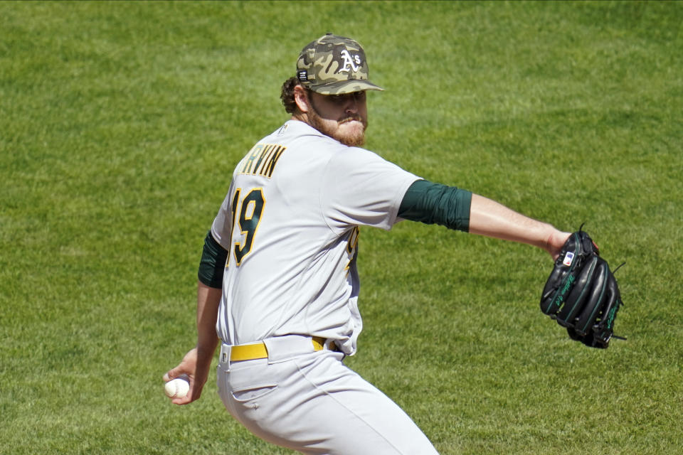 Oakland Athletics' pitcher Cole Irvin throws against the Minnesota Twins in the first inning of a baseball game, Saturday, May 15, 2021, in Minneapolis. (AP Photo/Jim Mone)