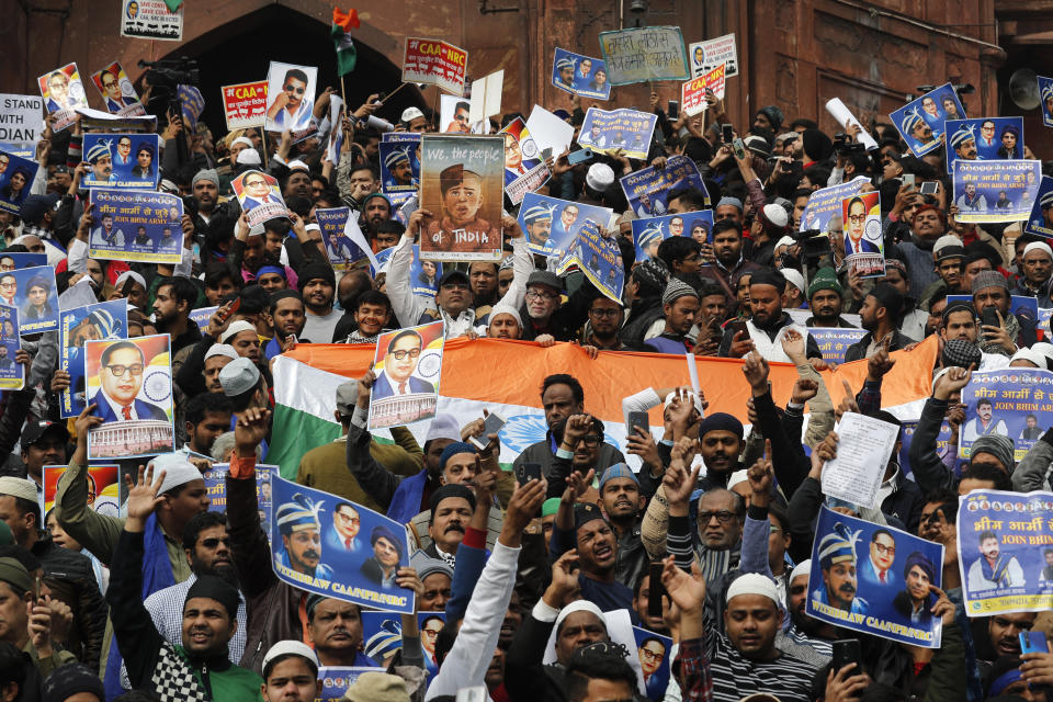 Indian Muslims along with activists of Bhim Army shout slogans against a new Citizenship law, after Friday prayers in New Delhi, India, Friday, Jan. 17, 2020. Protests against India's citizenship law that excludes Muslim immigrants continue in Indian cities in an unabating strong show of dissent against the Hindu nationalist government of Prime Minister Narendra Modi. The protest at a 17th century mosque, Jama Masjid, was led by Chandrashekhar Azad, leader of the Bhim Army, a political party of Dalits who represent Hinduism's lowest caste. (AP Photo/Manish Swarup)