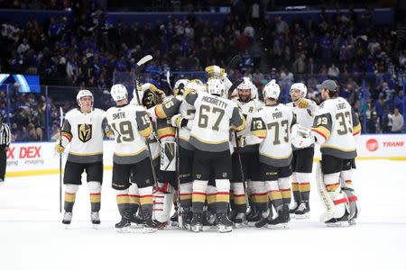 Feb 5, 2019; Tampa, FL, USA; Vegas Golden Knights celebrate as they beat the Tampa Bay Lightning in a shootout at Amalie Arena. Mandatory Credit: Kim Klement-USA TODAY Sports