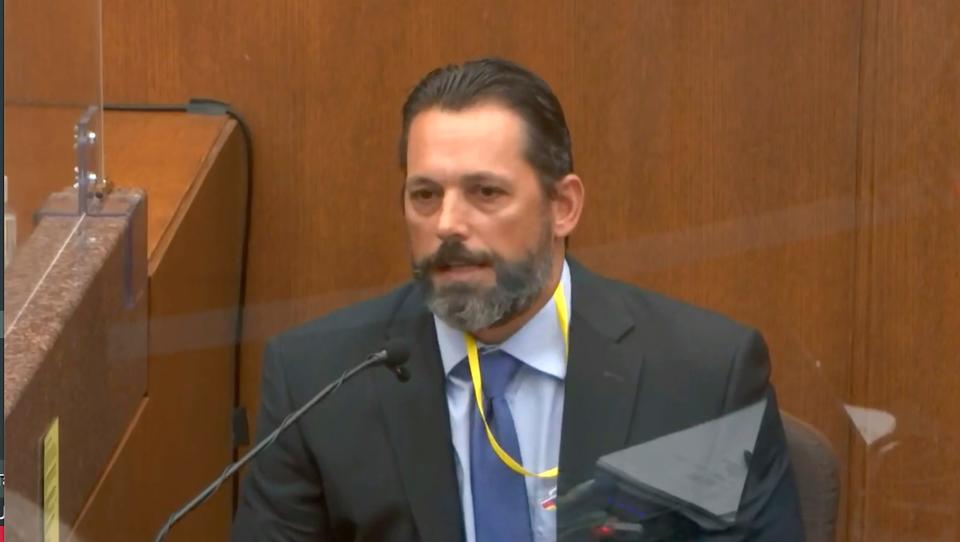 In this image from video, Minneapolis Police Lt. Johnny Mercil, a use of force trainer, testifies as Hennepin County Judge Peter Cahill presides Tuesday, April 6, 2021, in the trial of former Minneapolis police Officer Derek Chauvin at the Hennepin County Courthouse in Minneapolis.