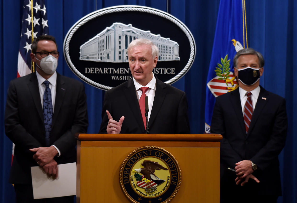Deputy Attorney General Jeffrey A. Rosen announces significant law enforcement actions related to the illegal sale of drugs and other illicit goods and services on the Darknet with Federal Bureau of Investigation Director Christopher Wray and ICE Acting Deputy Director Derek Benner during a news conference at the Department of Justice in Washington, U.S., September 22, 2020. (Olivier Douliery/Pool via Reuters) 