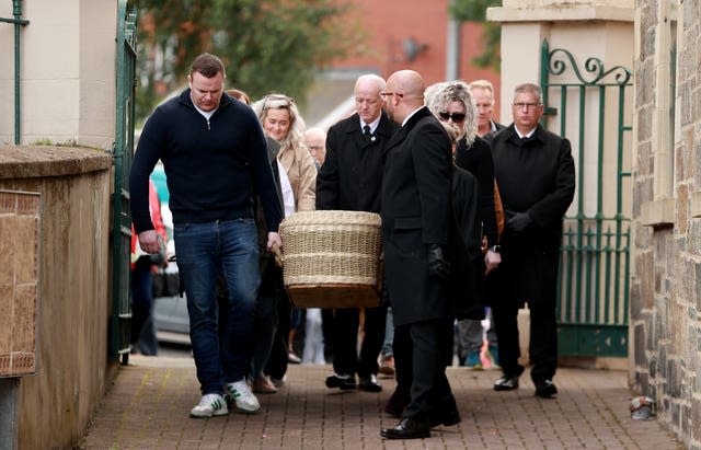 he coffin carrying Nell McCafferty is carried into St Columba’s Church