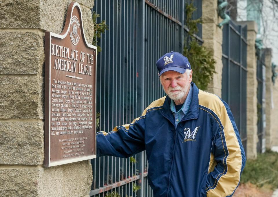 Bob Buege seen with the "Birthplace of the American League" plaque Friday, Jan. 6, 2023, located on the east side of 333 State St., Milwaukee. Buege is one of the people responsible for the plaque being where it is. As a result of a proposal for a new hotel on the property, the visibility of this plaque in the near future is indeterminate. "I'd like them to keep this plaque where it is visible," he said. "I want to suggest that they consider that before they replace it, move it or whatever they do."