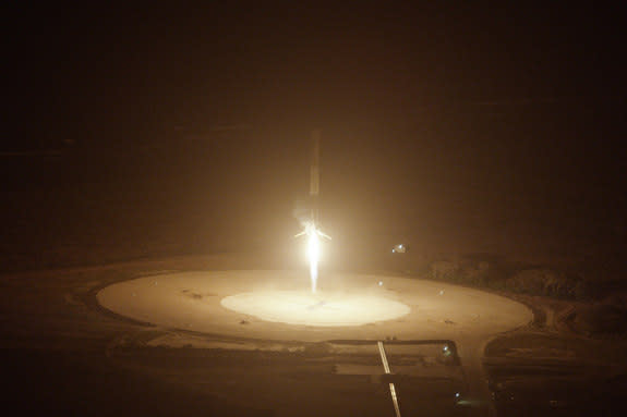 The first stage of SpaceX's Falcon 9 rocket is seen just before touching down on Landing Site 1 at Florida's Cape Canaveral Air Force Station on Dec. 21, 2015.