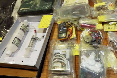 Items relating to making explosives, seized during an operation, are displayed during a news conference at police headquarters in Hong Kong, China June 15, 2015. REUTERS/Bobby Yip