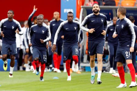 Soccer Football - World Cup - Group C - France vs Peru - Ekaterinburg Arena, Yekaterinburg, Russia - June 21, 2018   France's N'Golo Kante, Blaise Matuidi and Adil Rami during the warm up before the match    REUTERS/Darren Staples