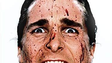 patrick bateman's face is covered in blood in an image from the classic horror movie american psycho