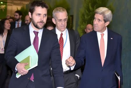 U.S. Secretary of State John Kerry (R) walks with White House senior advisor Brian Deese (L) and U.S. Special Envoy for Climate Change Todd Stern (C) to attend a meeting with French Foreign Minister during the COP 21 United Nations conference on climate change at Le Bourget on the outskirts of Paris, December 10, 2015. REUTERS/Mandel Ngan/Pool