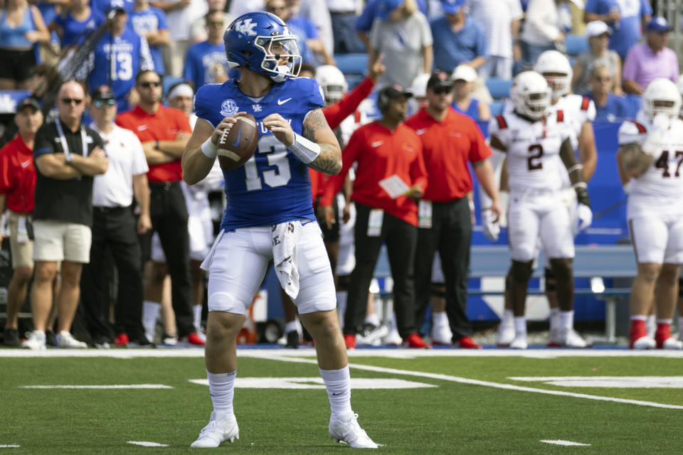 Kentucky quarterback Devin Leary (13) looks to pass during the first half of an NCAA college football game against Ball State in Lexington, Ky., Saturday, Sept. 2, 2023. (AP Photo/Michelle Haas Hutchins)