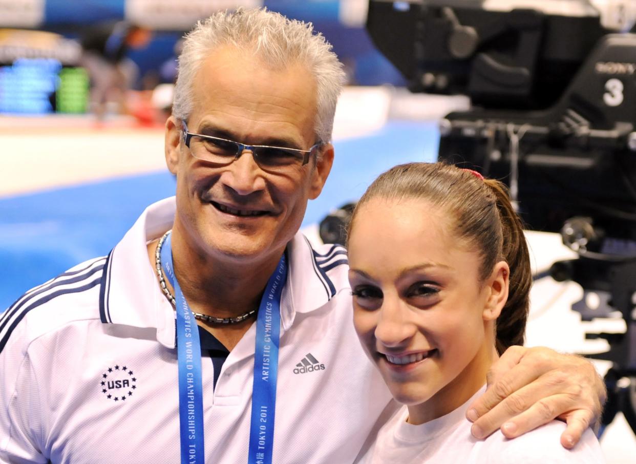 Former USA Gymnastics Olympic coach John Geddert with Olympian Jordyn Wieber in 2011.&nbsp; (Photo: KAZUHIRO NOGI via Getty Images)