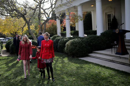White House senior advisor Ivanka Trump accompanied by her daughter Arabella Kushner and sister Tiffany Trump (L) participate in the 70th National Thanksgiving turkey pardoning ceremony in the Rose Garden of the White House in Washington, U.S., November 21, 2017. REUTERS/Carlos Barria