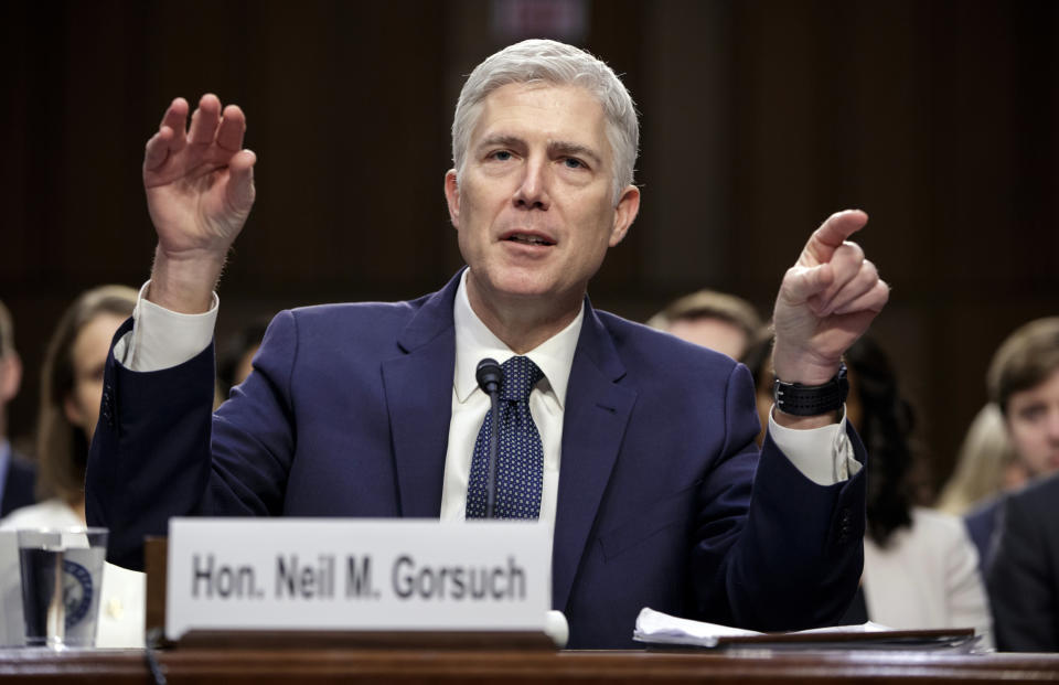 FILE - In this March 22, 2017, file photo, Supreme Court Justice nominee Judge Neil Gorsuch testifies on Capitol Hill in Washington, at his confirmation hearing before the Senate Judiciary Committee. The Senate is headed for a tense showdown over President Donald Trump’s Supreme Court nominee that could have far-reaching consequences for Congress, the high court and the nation. (AP Photo/J. Scott Applewhite, file)