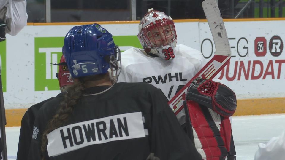 Defender Victoria Howran and goalie Emerance Maschmeyer are pictured at the Ottawa team's first practice on Friday.