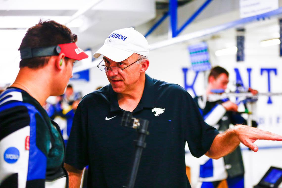 Kentucky rifle coach Harry Mullins, right, tied Adolph Rupp for the most NCAA championships won by a Division I coach in the commonwealth last season when the Wildcats won their fourth rifle national title.