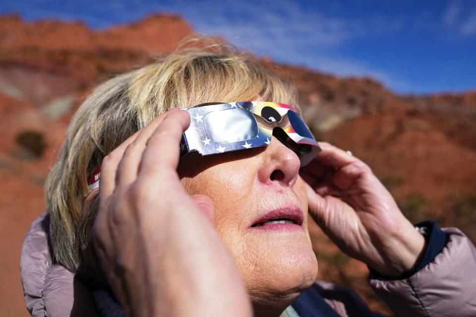 <p>George Frey/Getty</p> Solar eclipse glasses.