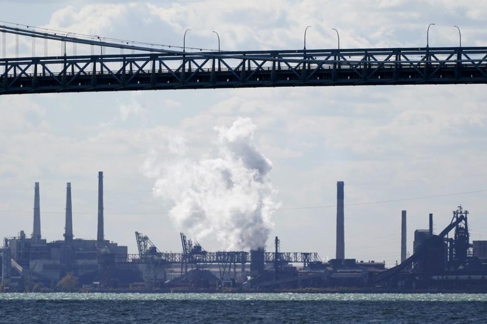 Zug Island, a heavily industrialized island at the southern city limits of Detroit is seen, Friday, Oct. 16, 2020, in Detroit. The area in Southwest Detroit has been the subject of numerous air pollution and public health studies. (AP Photo/Carlos Osorio)
