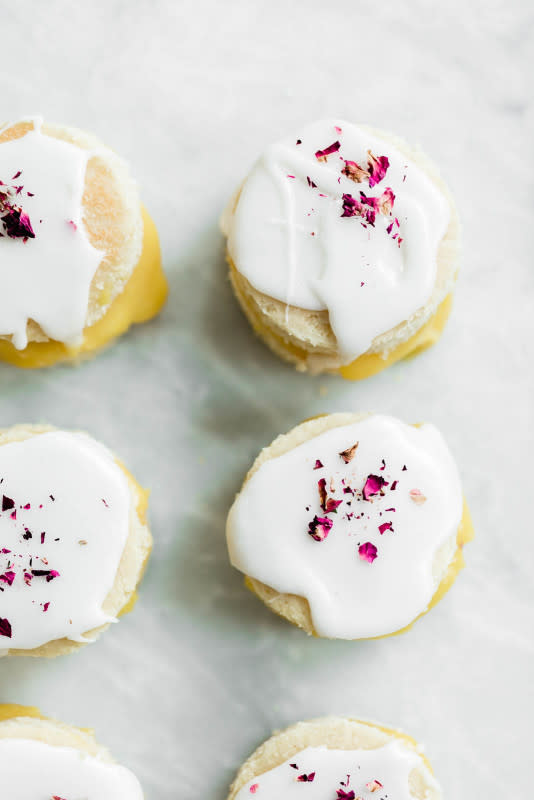 <p>Broma Bakery</p><p>Coconut lemon curd petit fours: homemade lemon curd sandwiched between two coconut flour cakes and topped with lemon icing.</p><p><strong>Get the recipe: <a href="https://bromabakery.com/coconut-lemon-curd-petit-fours/" rel="nofollow noopener" target="_blank" data-ylk="slk:Coconut Lemon Curd Petit Fours;elm:context_link;itc:0;sec:content-canvas" class="link ">Coconut Lemon Curd Petit Fours</a></strong></p>